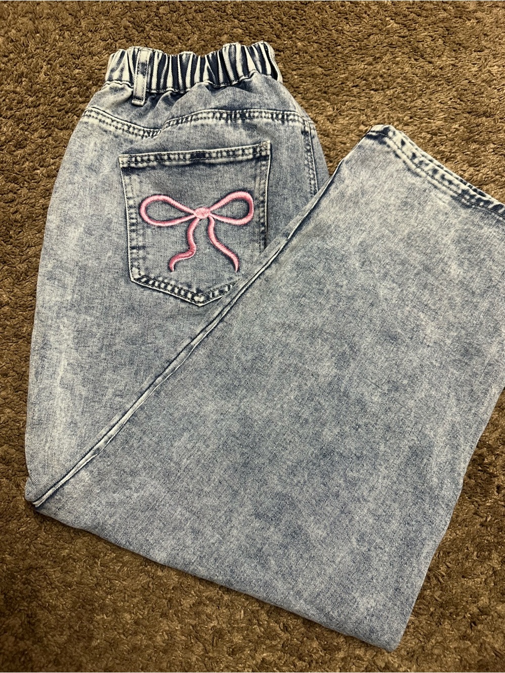 SHEIN Light Blue High Rise Jeans with Pink Bow Accent